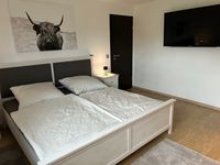 Schlafzimmer mit Doppelbett